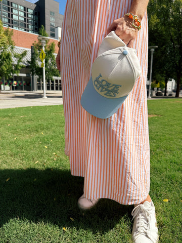 LOVE GIVES Hat in - Merch photo