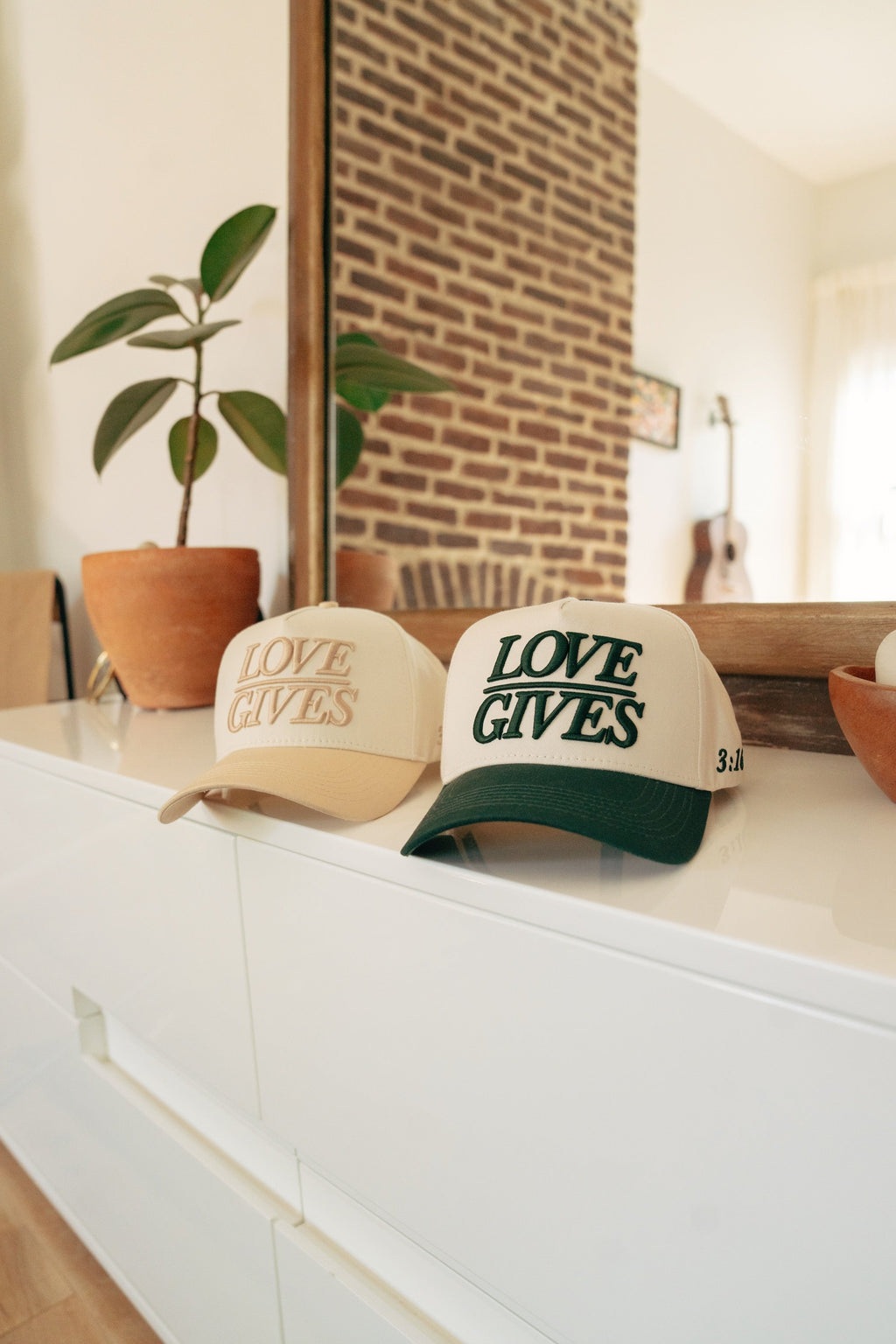 LOVE GIVES Hat in - Merch photo