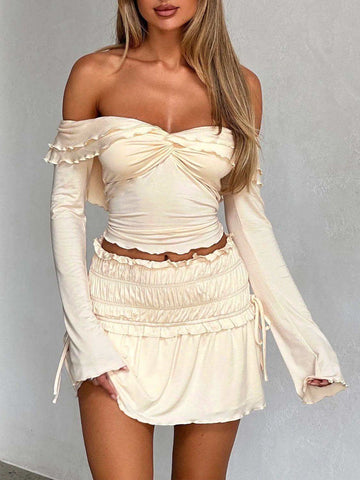 Devine Twisted Ruffled Off-Shoulder Long Sleeve T-Shirt in - tops photo