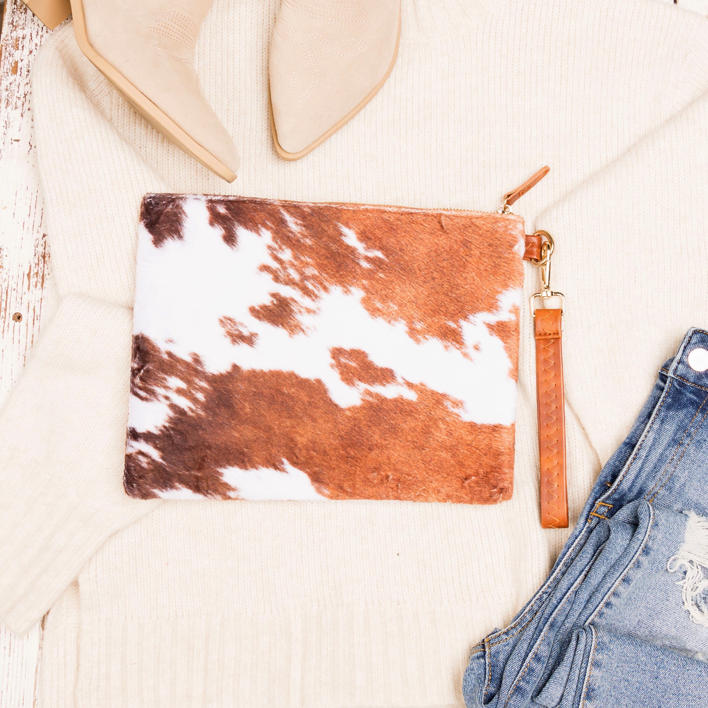 Western Fur Clutch in Brown Cow - photo