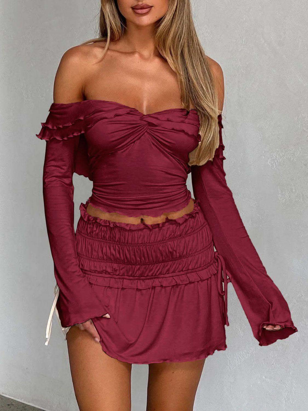 Devine Twisted Ruffled Off-Shoulder Long Sleeve T-Shirt in - tops photo