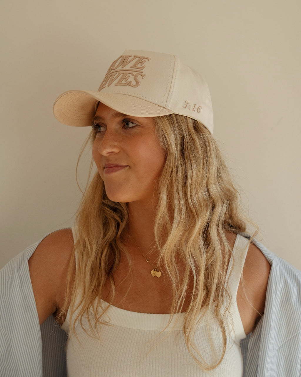 LOVE GIVES Hat in - Merch photo