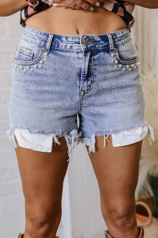Pearl Studded Pockets Raw Hem Denim Shorts in Light Blue - photo