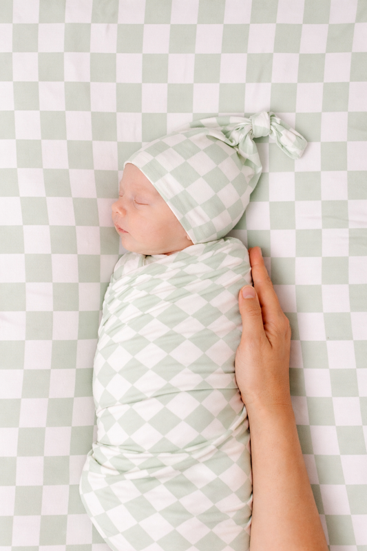 Leaf Green & White Checkered Stretch Swaddle in - photo
