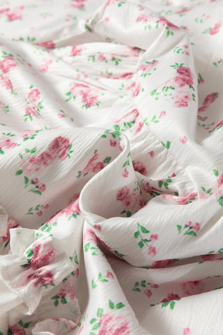 Lottie Detail Flared Mini Dress in - Floral Dresses photo