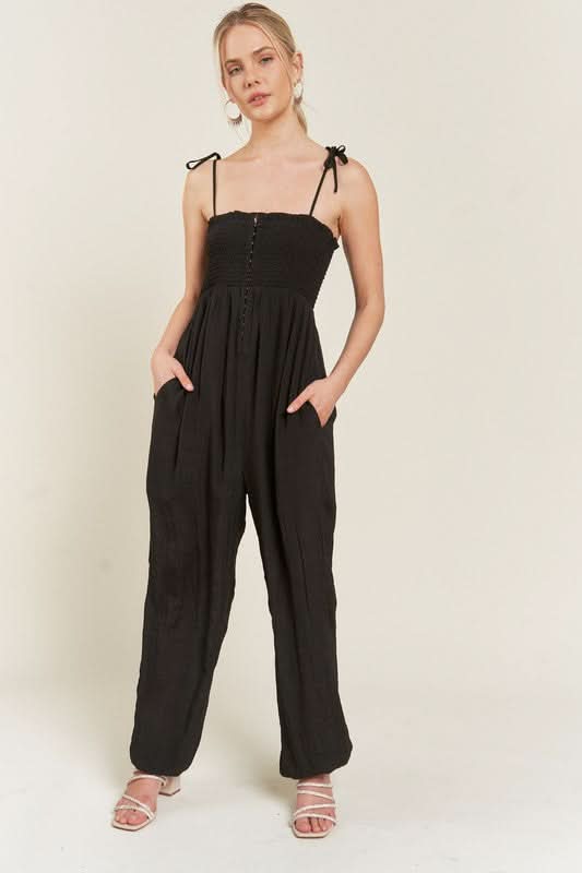 SMOCKED TIE STRAP JUMPSUIT in BLACK - photo