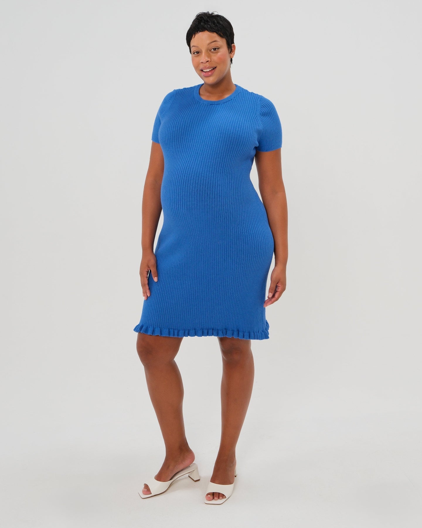 Short Sleeve Knit Maternity Dress with Playful Hem Detail in - photo