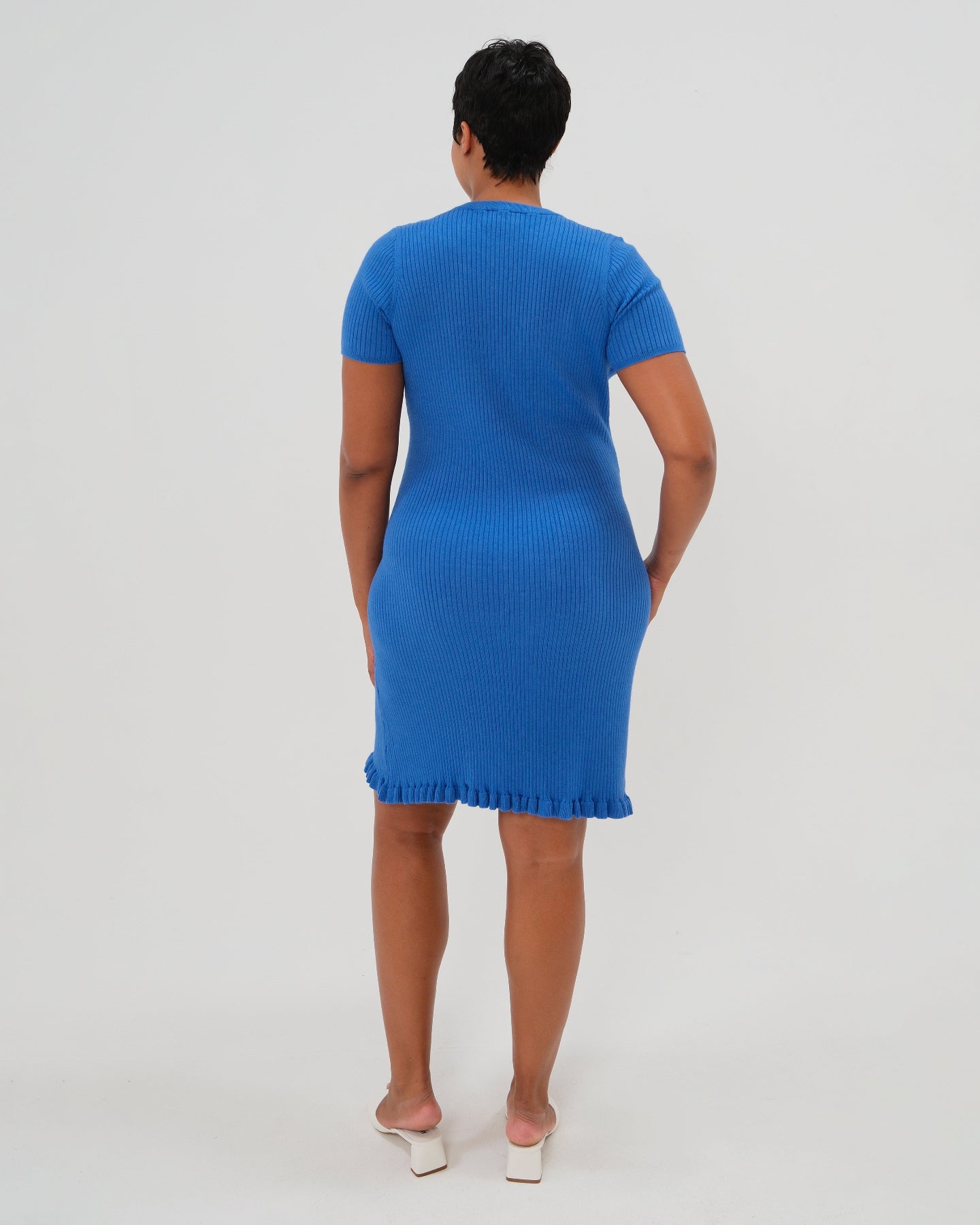 Short Sleeve Knit Maternity Dress with Playful Hem Detail in - photo