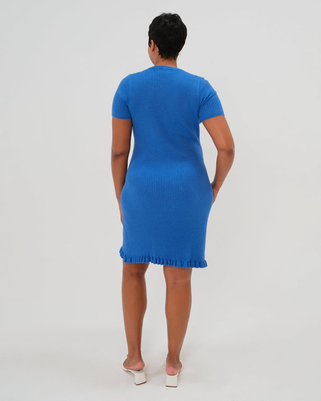 Short Sleeve Knit Maternity Dress with Playful Hem Detail in - photo