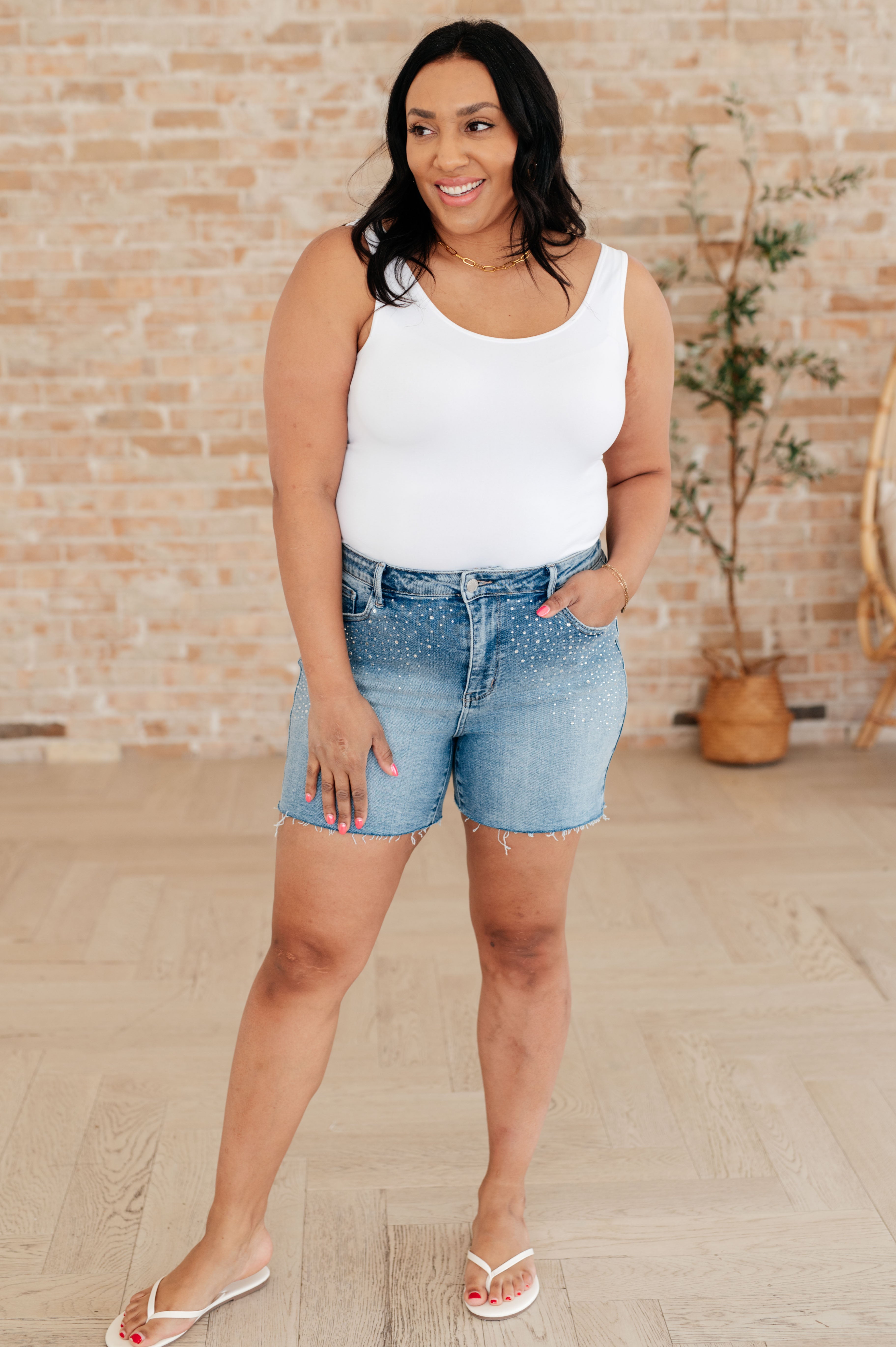 Elle High Rise Rhinestone Cutoff Shorts in - Denim photo