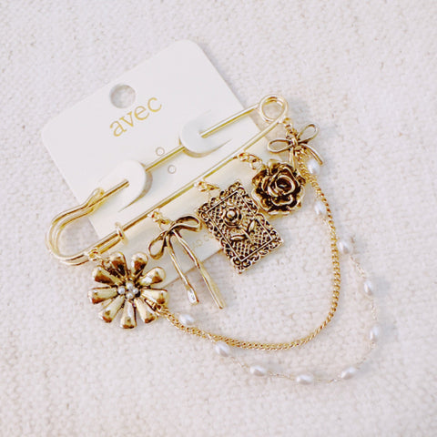 Floral Ribbon Pin Brooch – Elegant Gold Safety Pin with Charms and Pearl Chains in - Fashion Accessories photo