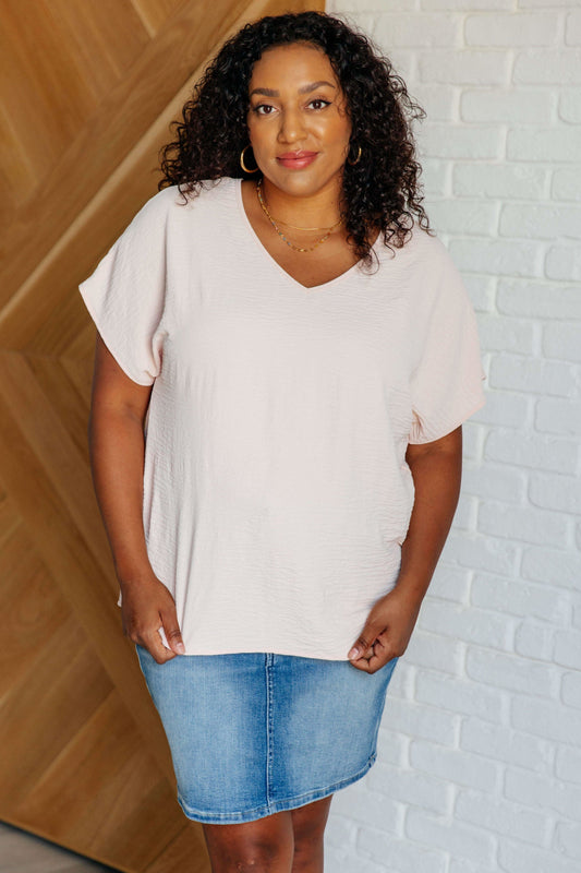 Frequently Asked Questions V-Neck Top in Blush in - Tops photo