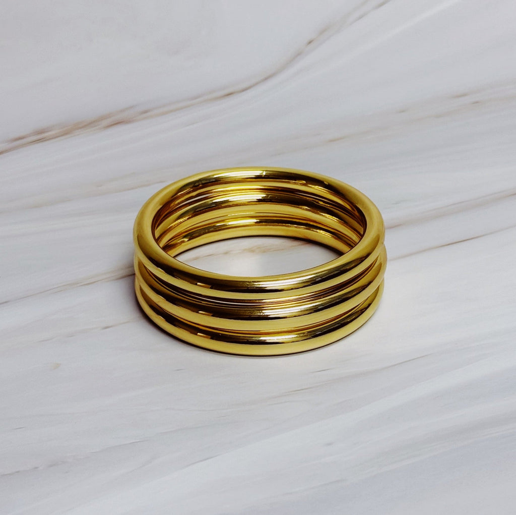 Golden Stack Luxe Bangle Set – Sleek Polished Gold-Tone Arm Candy in Classic Stacking Style in - Jewelry photo