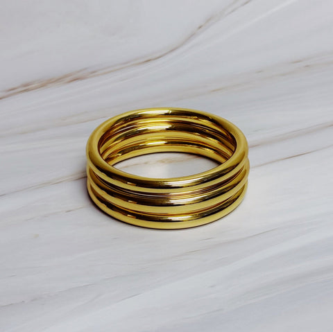 Golden Stack Luxe Bangle Set – Sleek Polished Gold-Tone Arm Candy in Classic Stacking Style in - Jewelry photo
