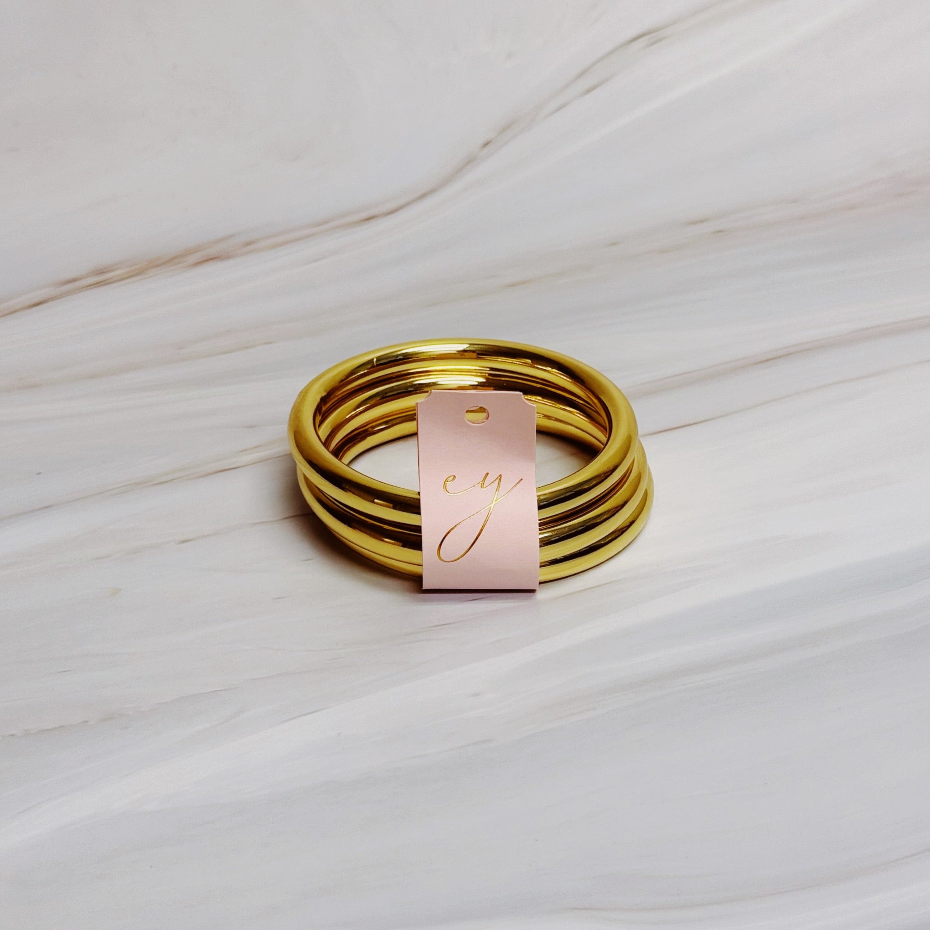 Golden Stack Luxe Bangle Set – Sleek Polished Gold-Tone Arm Candy in Classic Stacking Style in - Jewelry photo