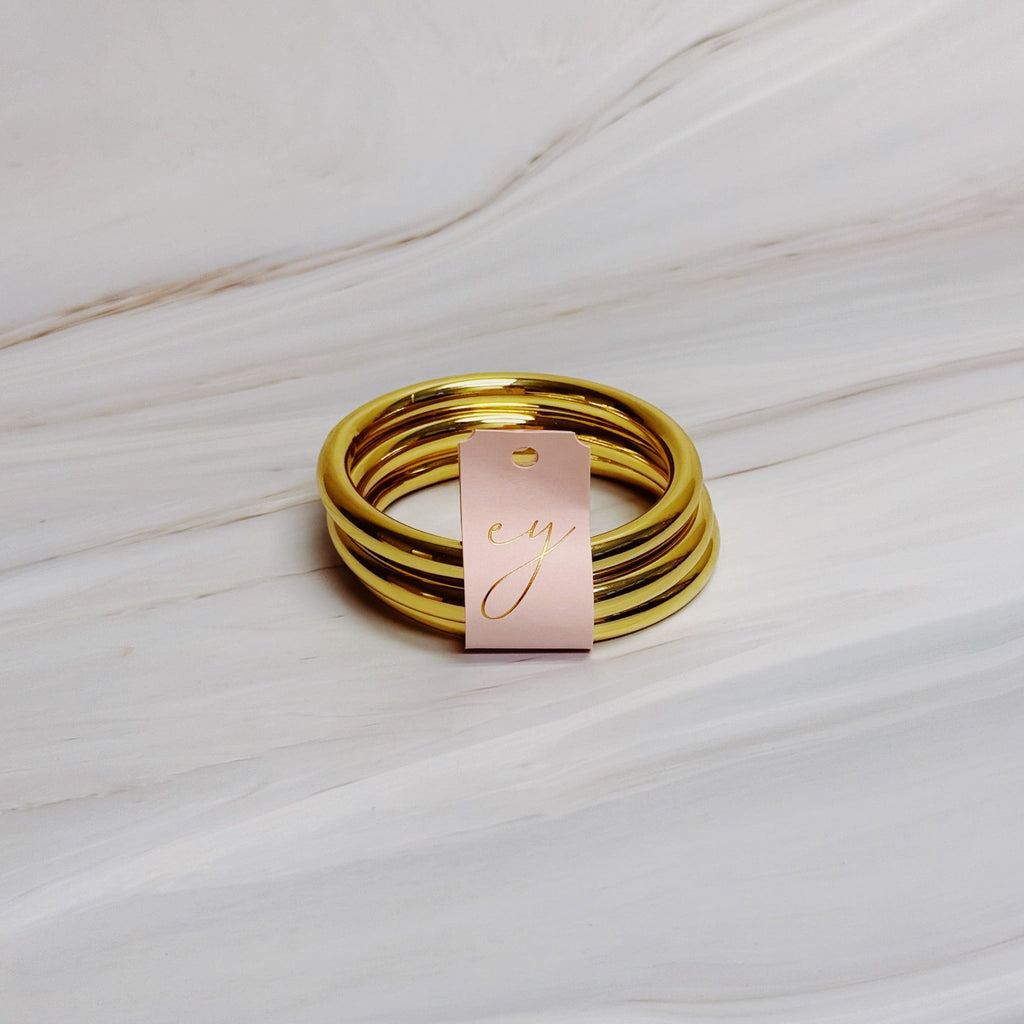 Golden Stack Luxe Bangle Set – Sleek Polished Gold-Tone Arm Candy in Classic Stacking Style in - Jewelry photo