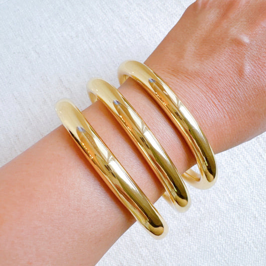 Golden Stack Luxe Bangle Set – Sleek Polished Gold-Tone Arm Candy in Classic Stacking Style in - Jewelry photo
