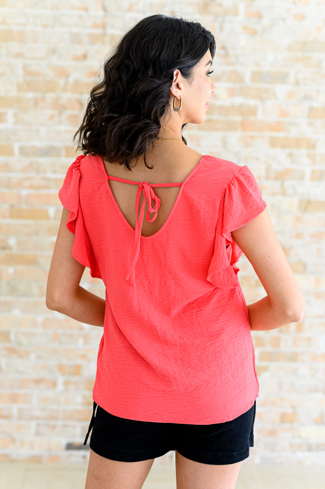Got Me Cornered V Neck Ruffle Sleeve Top in - Tops photo