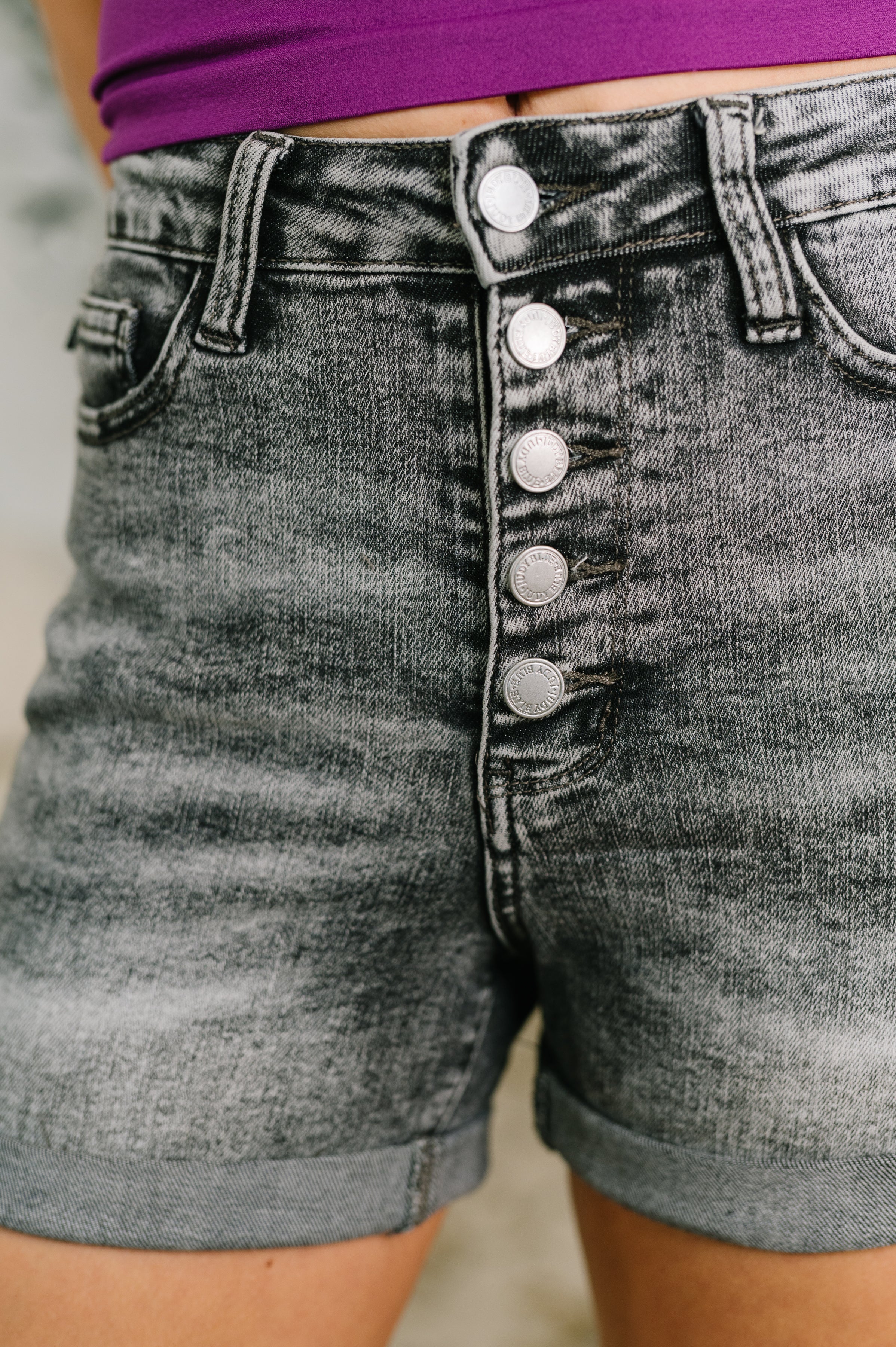 Greyson High Rise Button Fly Cuffed Shorts in Grey -
