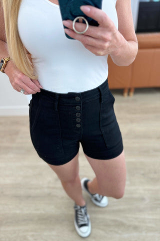 Reagan High Rise Button Fly Trouser Shorts in - Denim photo