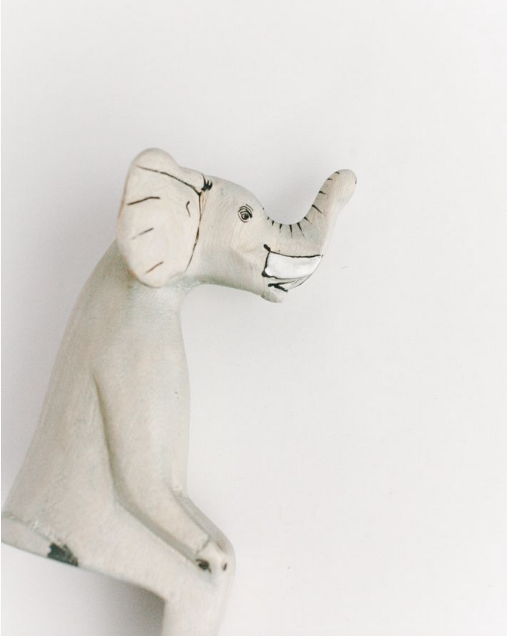 Hand-carved Elephant Shelf Sitter in - Decor photo