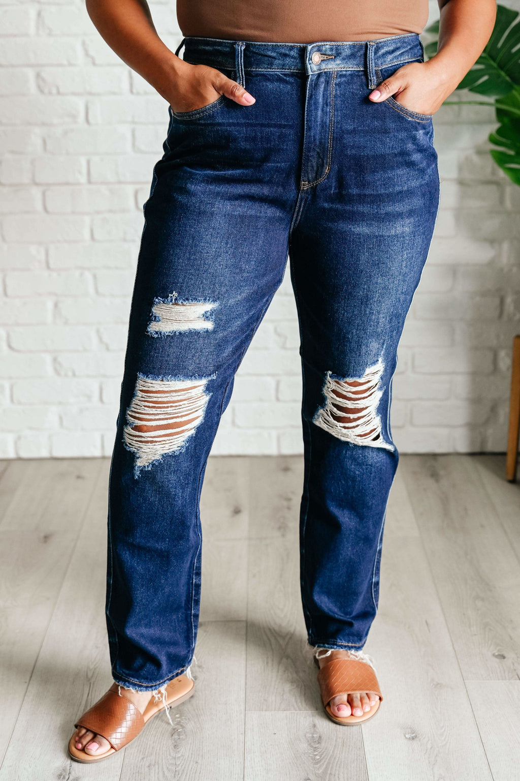 Montana High Rise Rigid Magic Distressed Straight Jeans in - Denim photo
