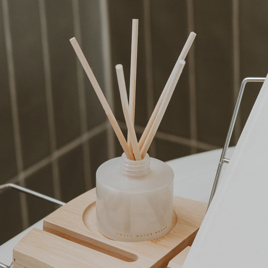 Cashmere and Vanilla White Translucent Tinted Glass Jar Reed Diffuser in - Reed Diffusers photo