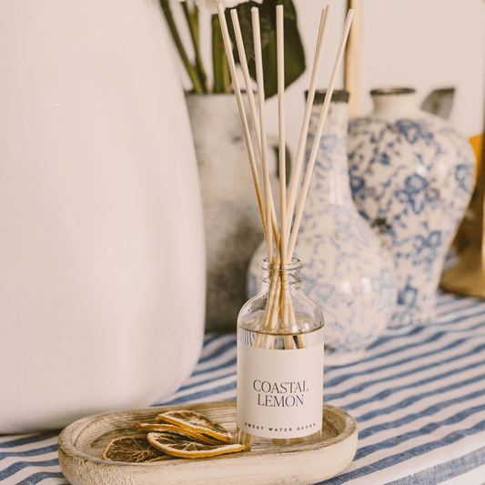 Sweet Water Decor Coastal Lemon Clear Reed Diffuser in - Reed Diffusers photo