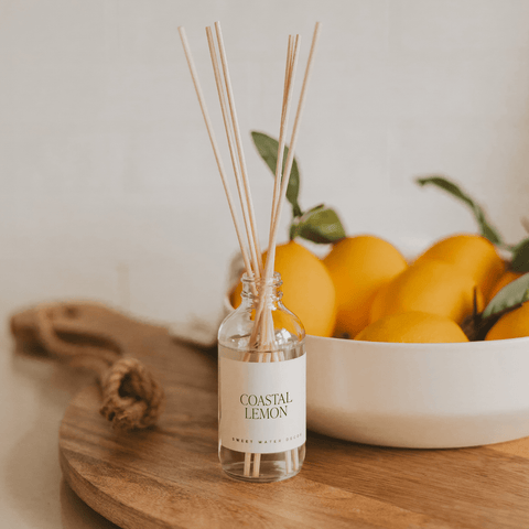 Sweet Water Decor Coastal Lemon Clear Reed Diffuser in - Reed Diffusers photo