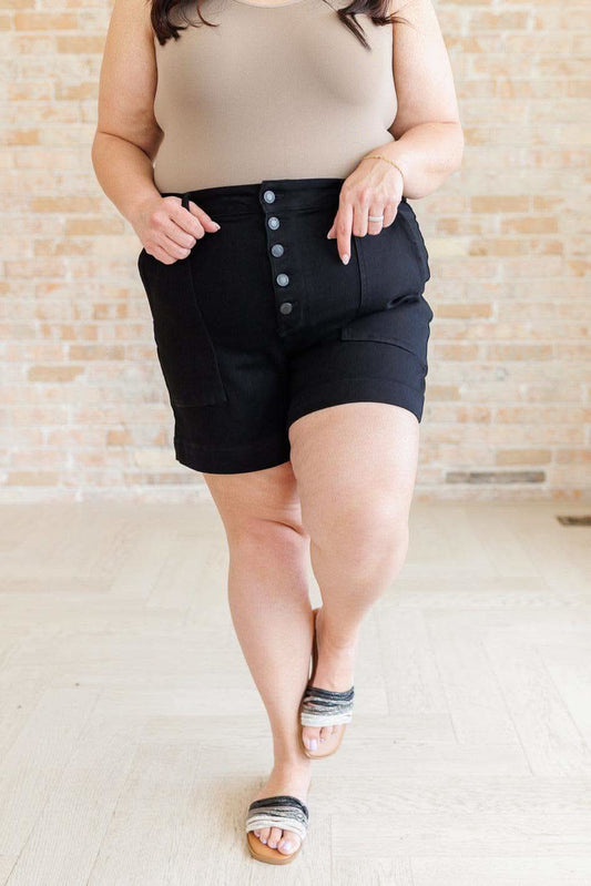 Reagan High Rise Button Fly Trouser Shorts in - Denim photo