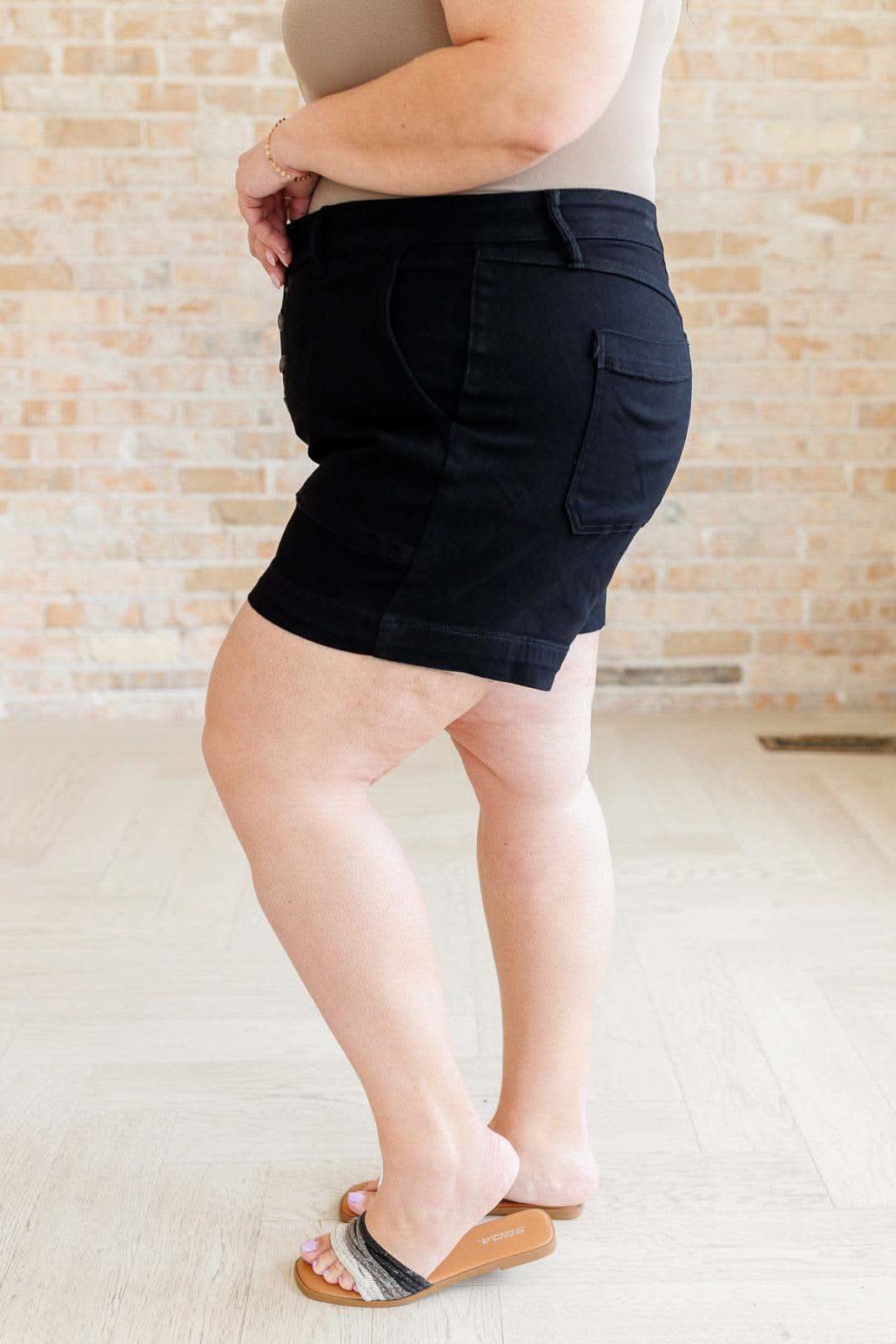 Reagan High Rise Button Fly Trouser Shorts in - Denim photo