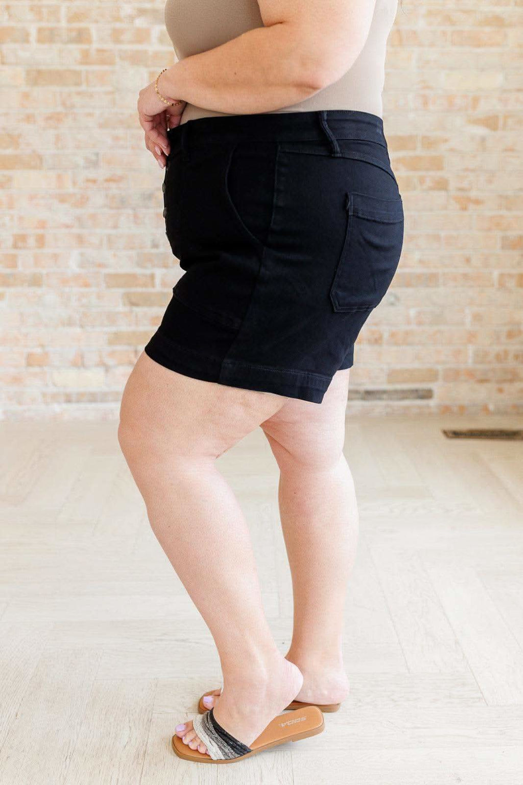 Reagan High Rise Button Fly Trouser Shorts in - Denim photo