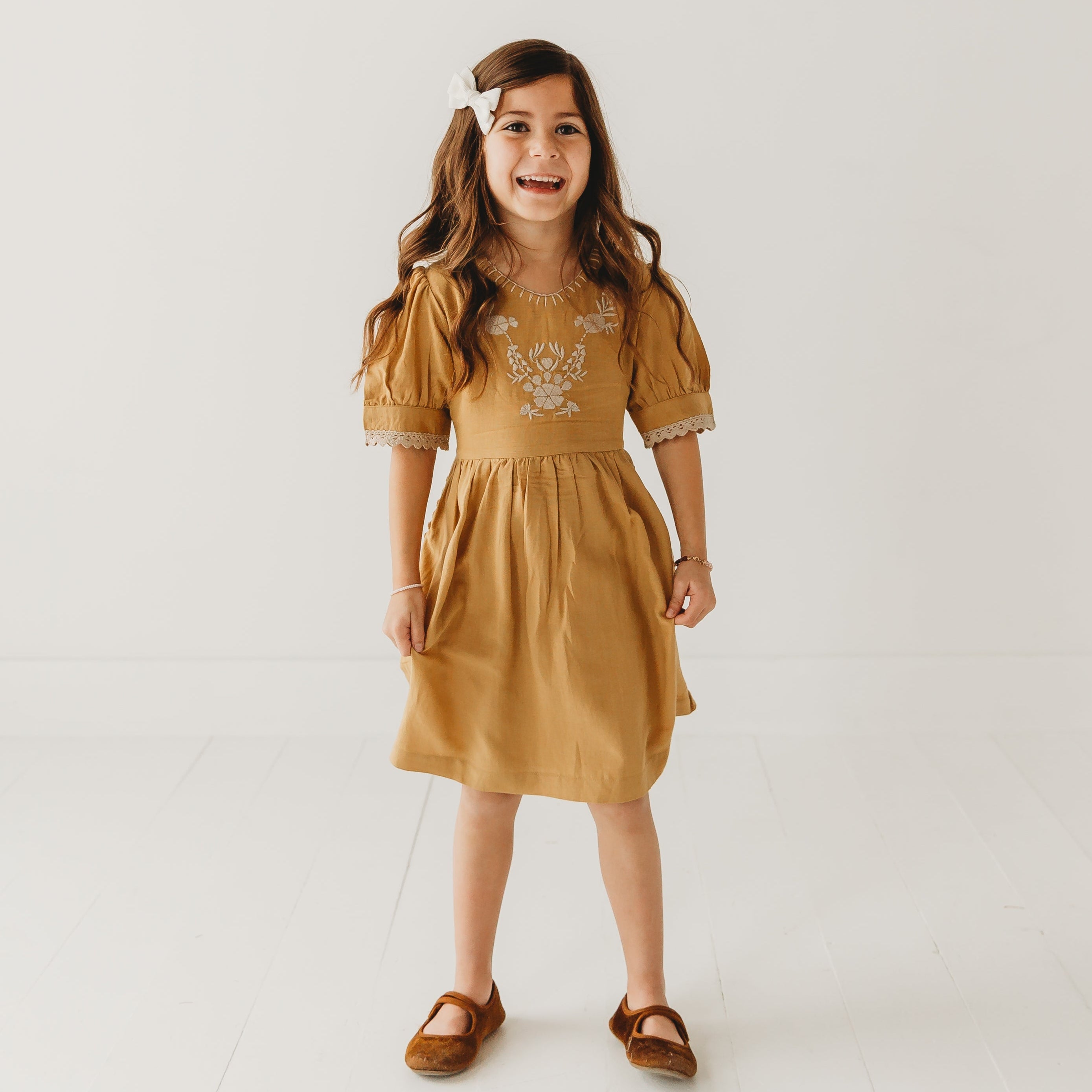 Embroidered yoke with Puff Sleeves in - Dress photo