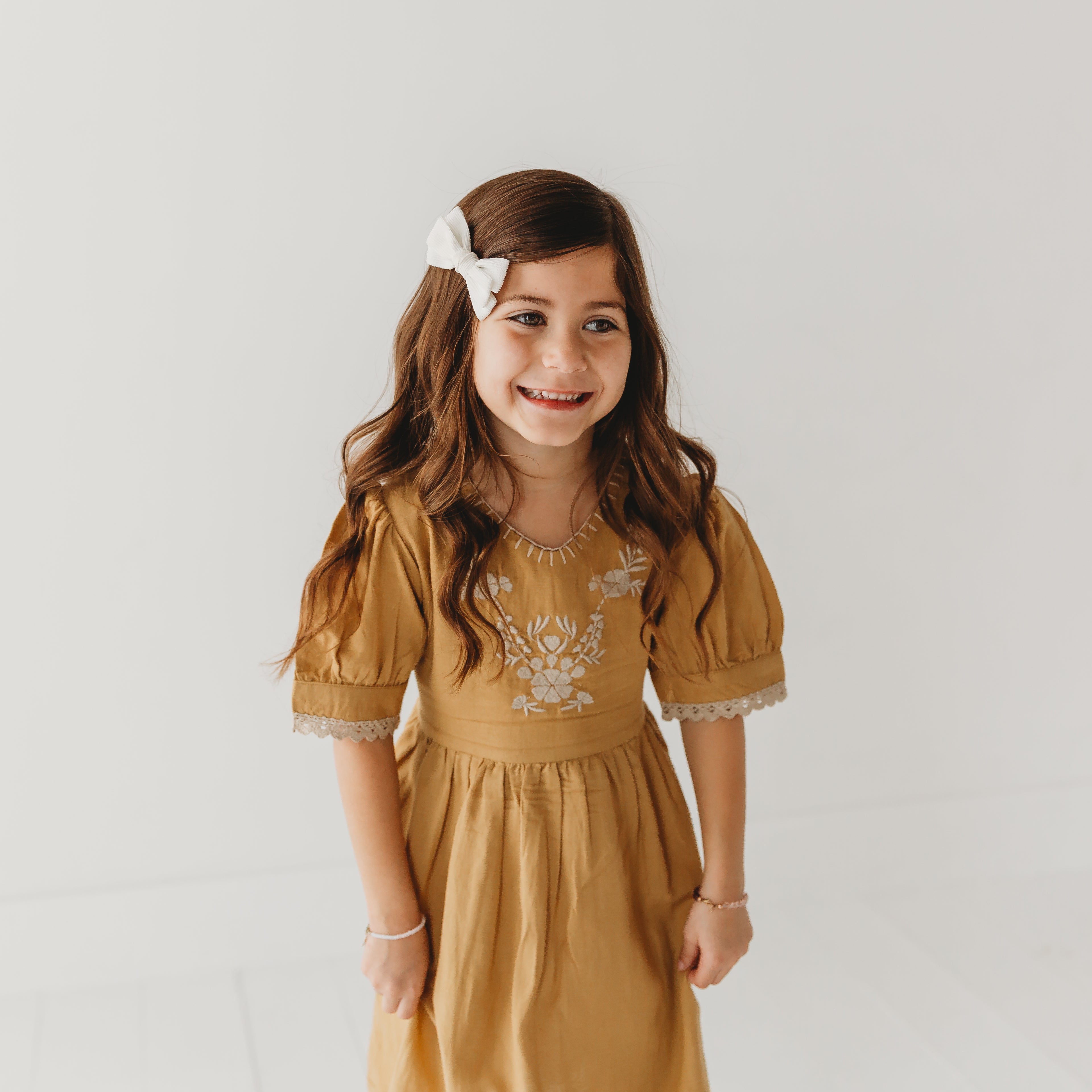 Embroidered yoke with Puff Sleeves in - Dress photo
