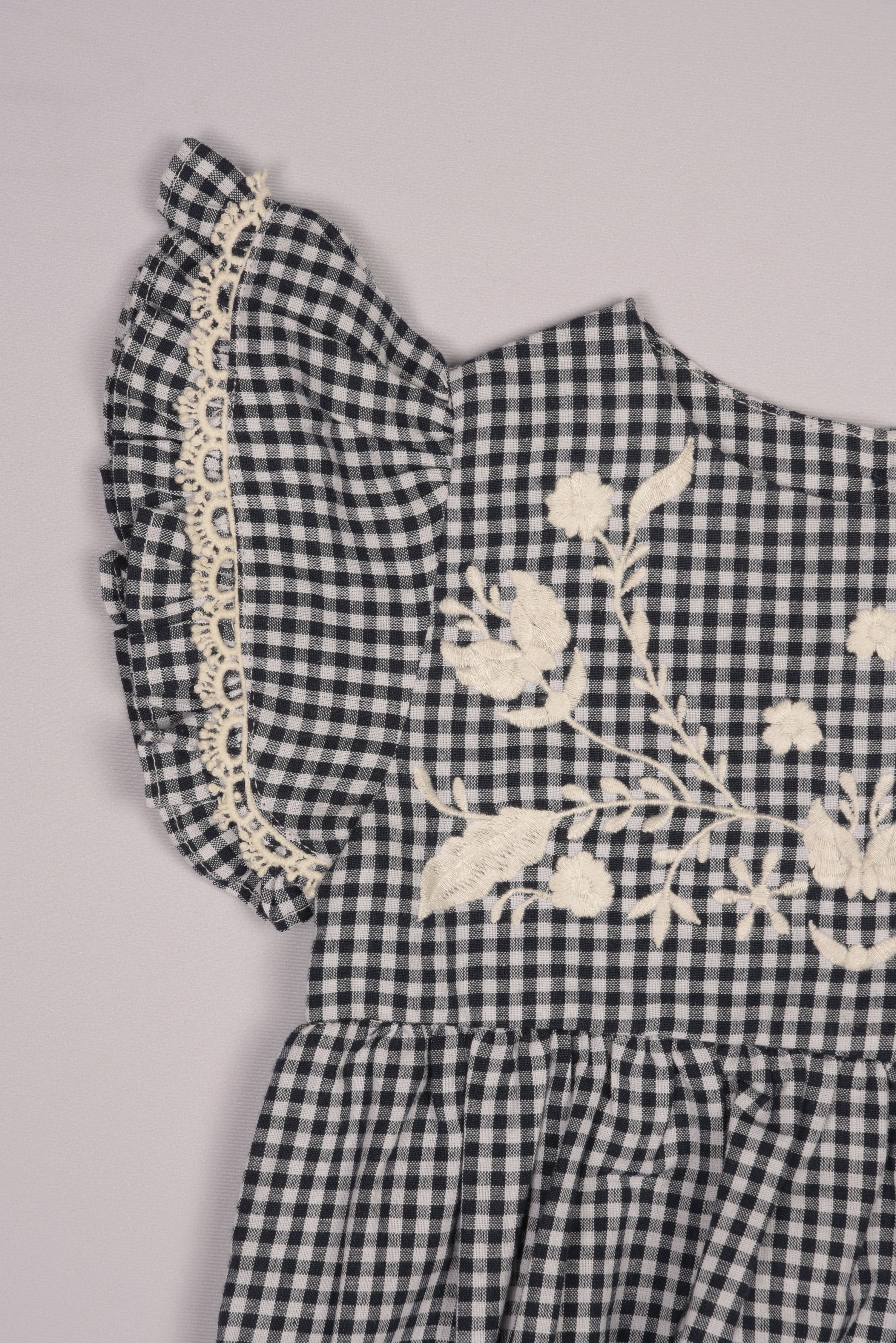 Embroidered Yoke Eith Ruffle Sleeves Romper in - Dress photo