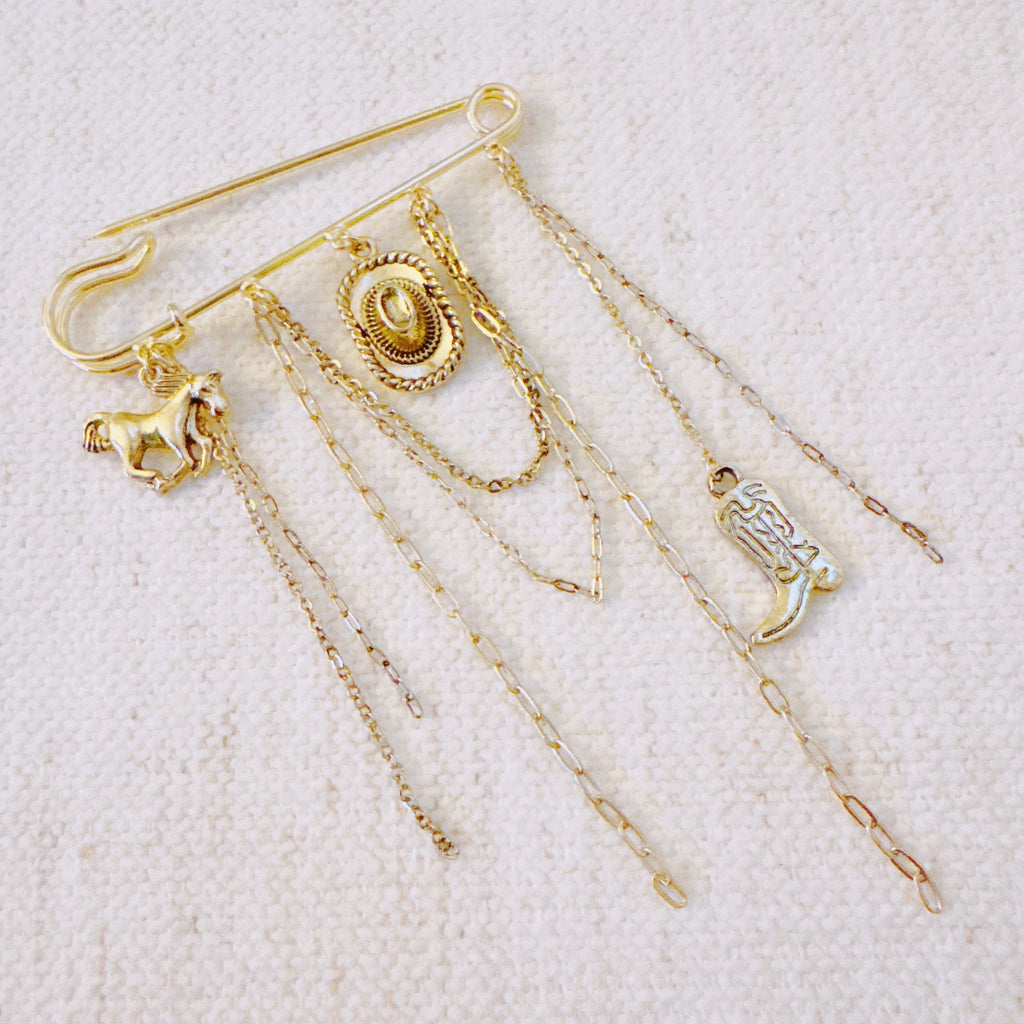 Western Charm Pin Brooch – Gold Safety Pin Style with Cowboy-Inspired Charms in - Fashion Accessories photo