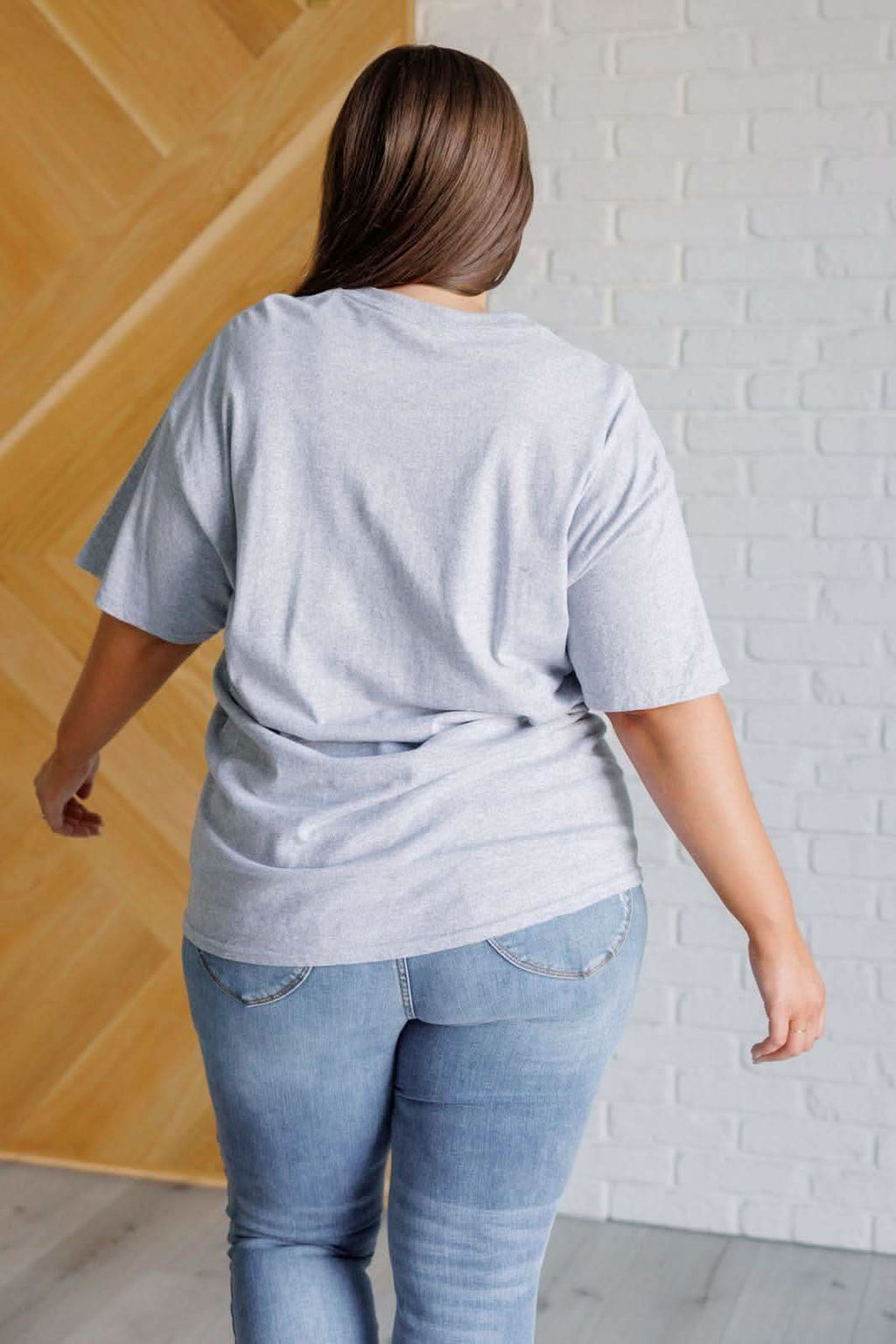 Wild & Free Horseshoe Graphic Tee in - Tops photo