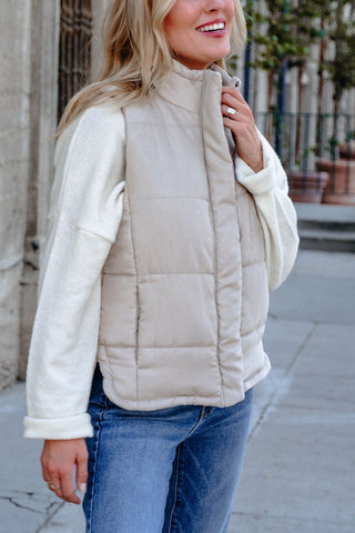 Beige Button Up Puffer Vest in - tops photo
