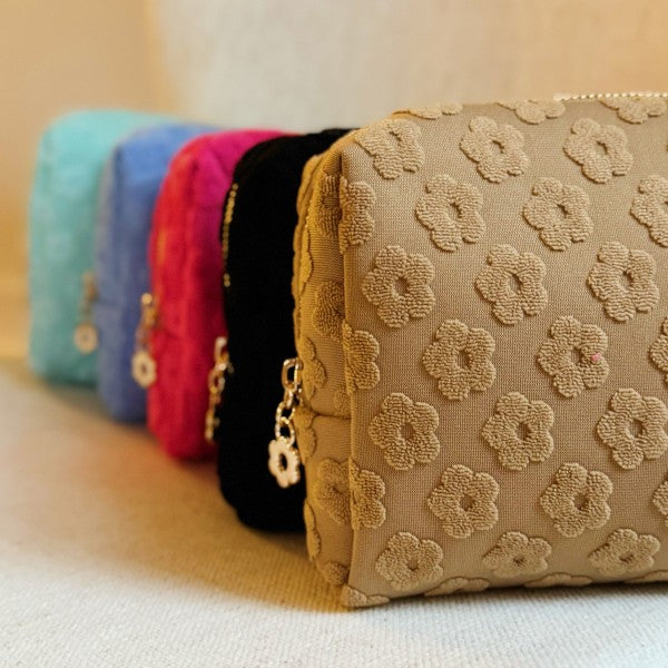 Embossed Daisy Blossom Cosmetic Case in One Size - photo