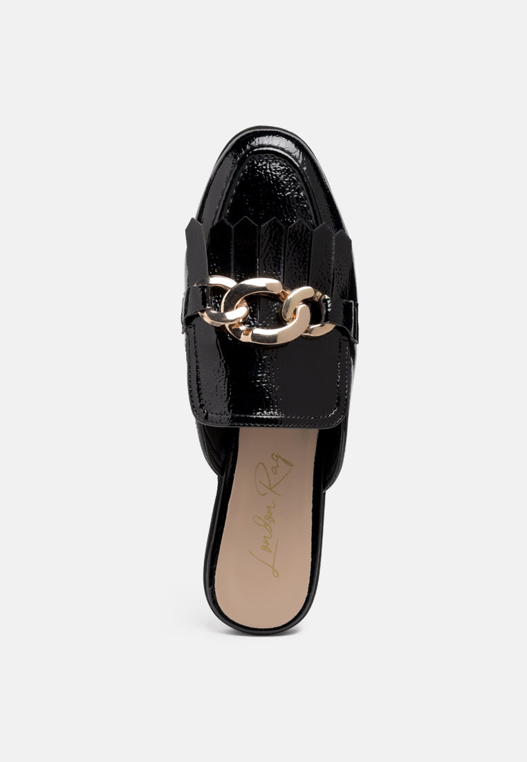 Gladioli Metal Buckled Fringe Detail Mules in - Mules photo