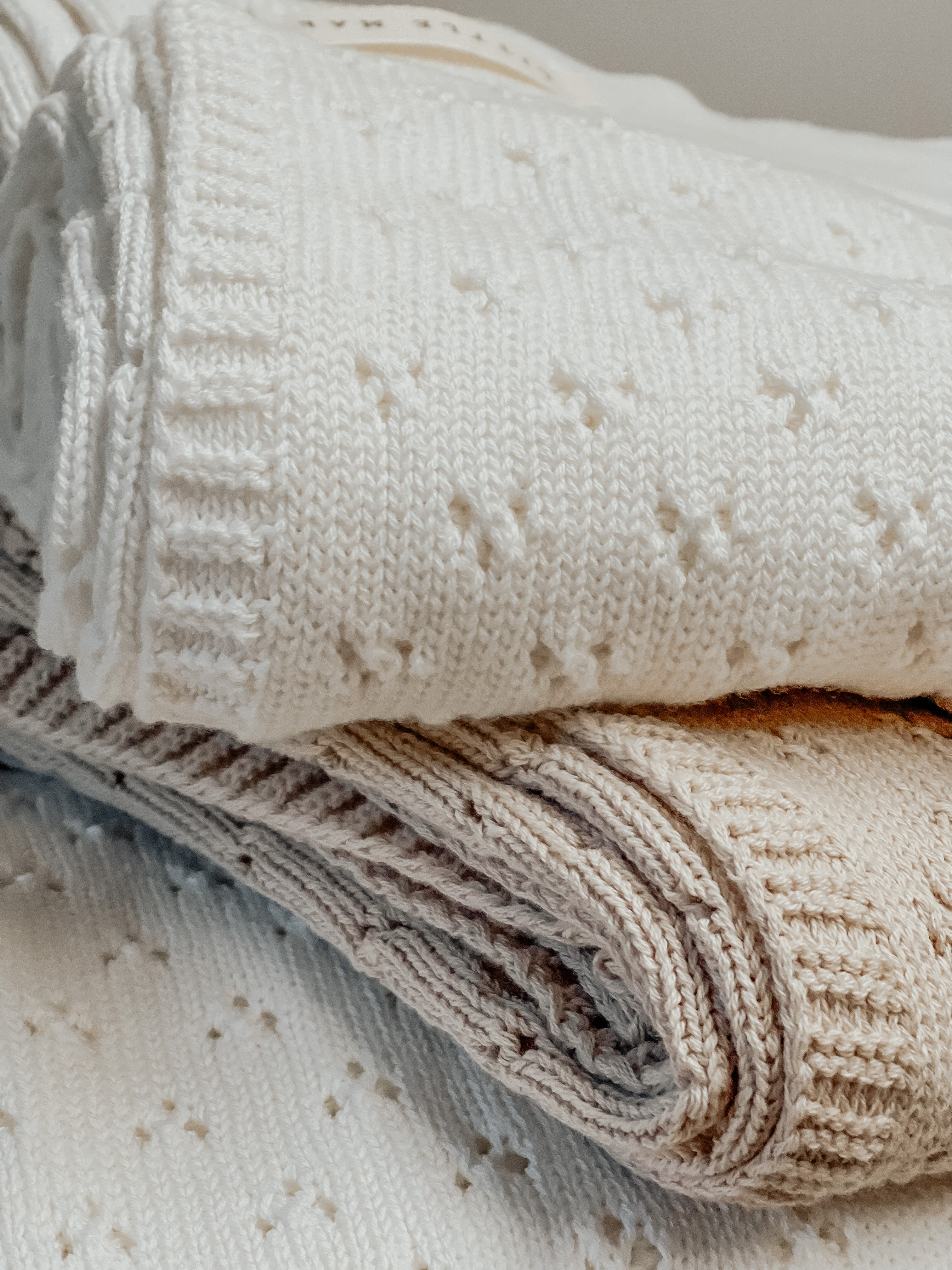Little Mae & Co. Toffee Pointelle Knit Blanket in - photo