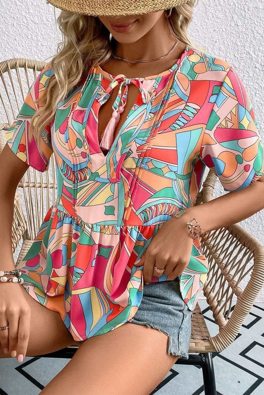 Printed Tie Neck Short Sleeve Blouse in - Shirts & Tops photo