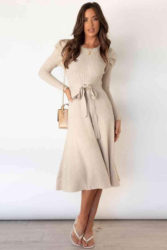 Amber Round Neck Long Sleeve Tie Waist Sweater Dress in - Dresses photo