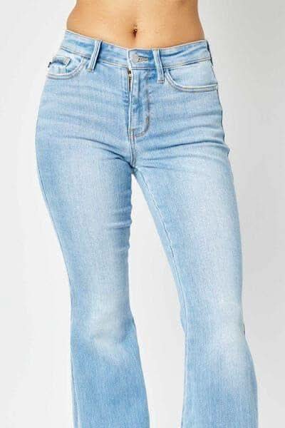 Judy Blue Full Size Mid Rise Raw Hem Slit Flare Jeans in - Pants photo