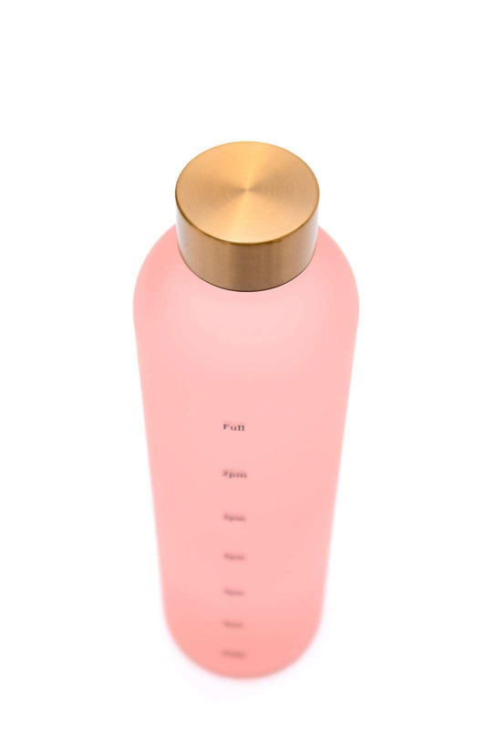 Sippin' Pretty 32 oz Translucent Water Bottle in Pink & Gold in - Tumblers photo